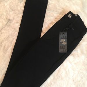 High Waisted Skinny Jeans With Knee Distressing